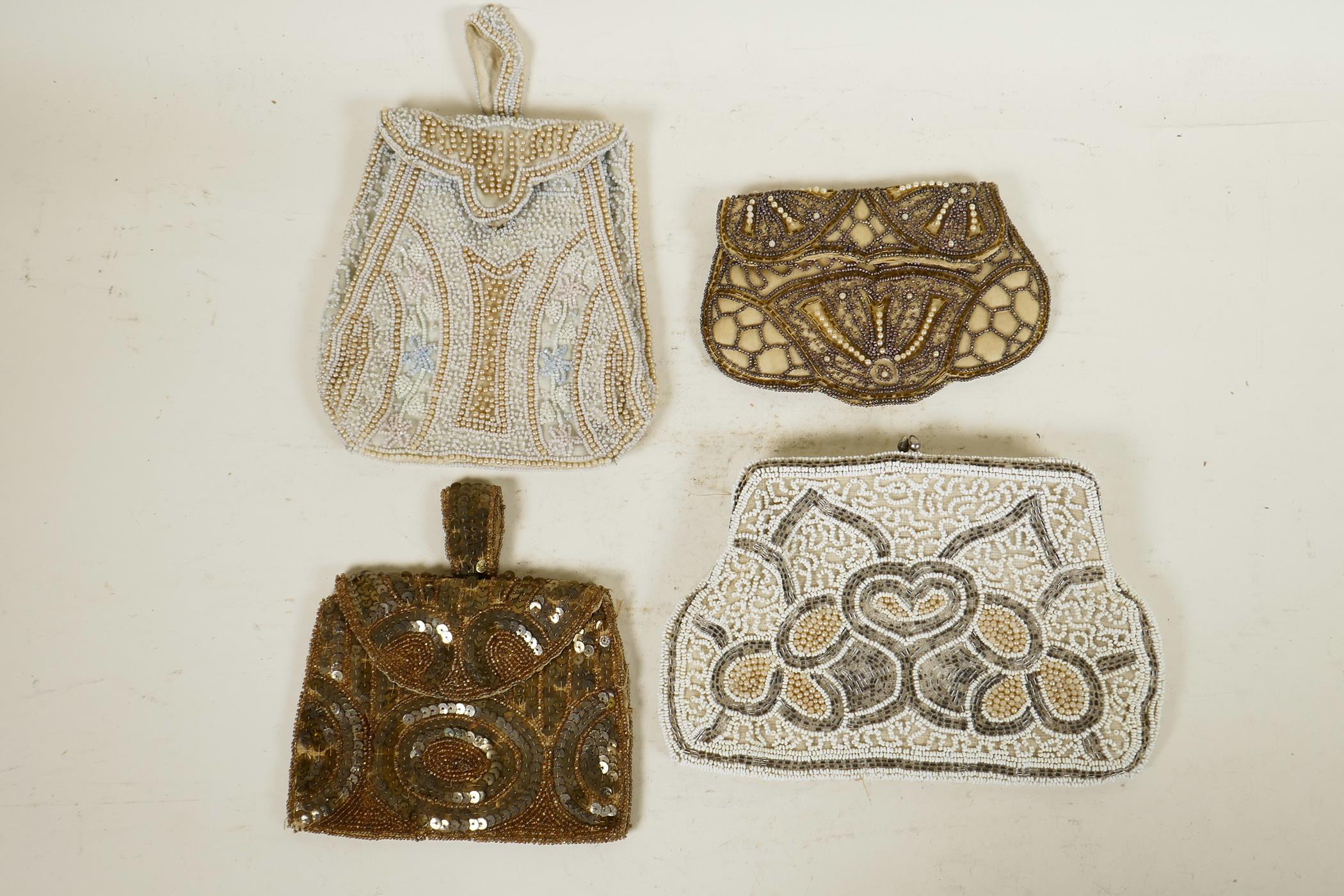 Four Art Deco ladies' beaded evening purses and bags, all hand stitched and embellished with glass