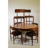 A mid century G-Plan teak 'Fresco' extending dining table and six chairs, designed by Victor B.