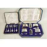 A cased six piece hallmarked silver cruet set from the Goldsmiths and Silversmiths Company,