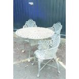 A painted, wrought iron Victorian style garden table and three chairs, 40" diameter