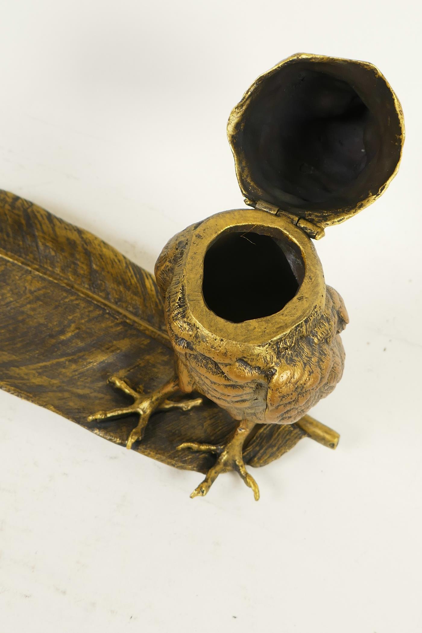 A bronze pen tray and inkwell cast as an owl standing on a large feather, 13½" long - Image 3 of 3