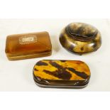 Three C19th snuff mulls, one horn, 2½" diameter, one tortoiseshell, 3" x 1½", and an early celluloid