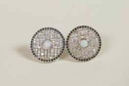 A pair of silver earrings set with an opalite surrounded by cubic zirconium