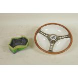 A Beswick ashtray in the form of a steering wheel produced for Les Leston Ltd, together with a