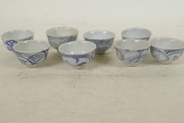 Eight C19th Chinese blue and white porcelain wine cups, 1¾" diameter