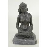 A modernist bronze figure of a female nude, on a slate base, 13½" high