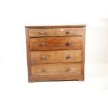 A Victorian mahogany chest of four long drawers, raised on a plinth base, 38" x 18" high