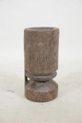 An African carved tree stump mortar, 16" high, 7½" diameter