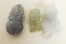 Three small Chinese carved jade amulets, largest 1½" long