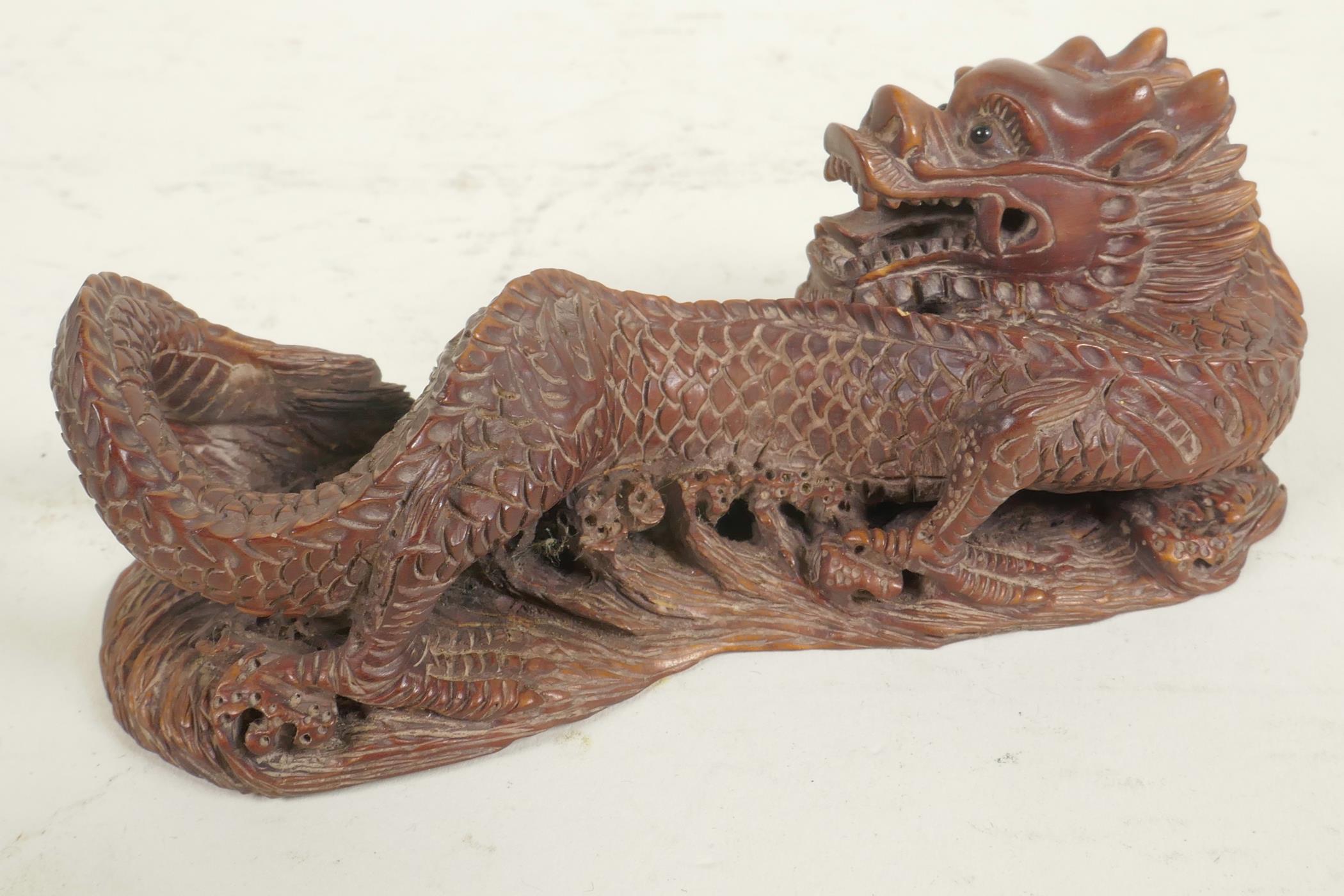 A Japanese carved hardwood okimono of a dragon, 4½" long - Image 2 of 3