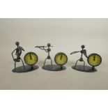 A set of three metal figural desk clocks in the form of musicians, 4½" high