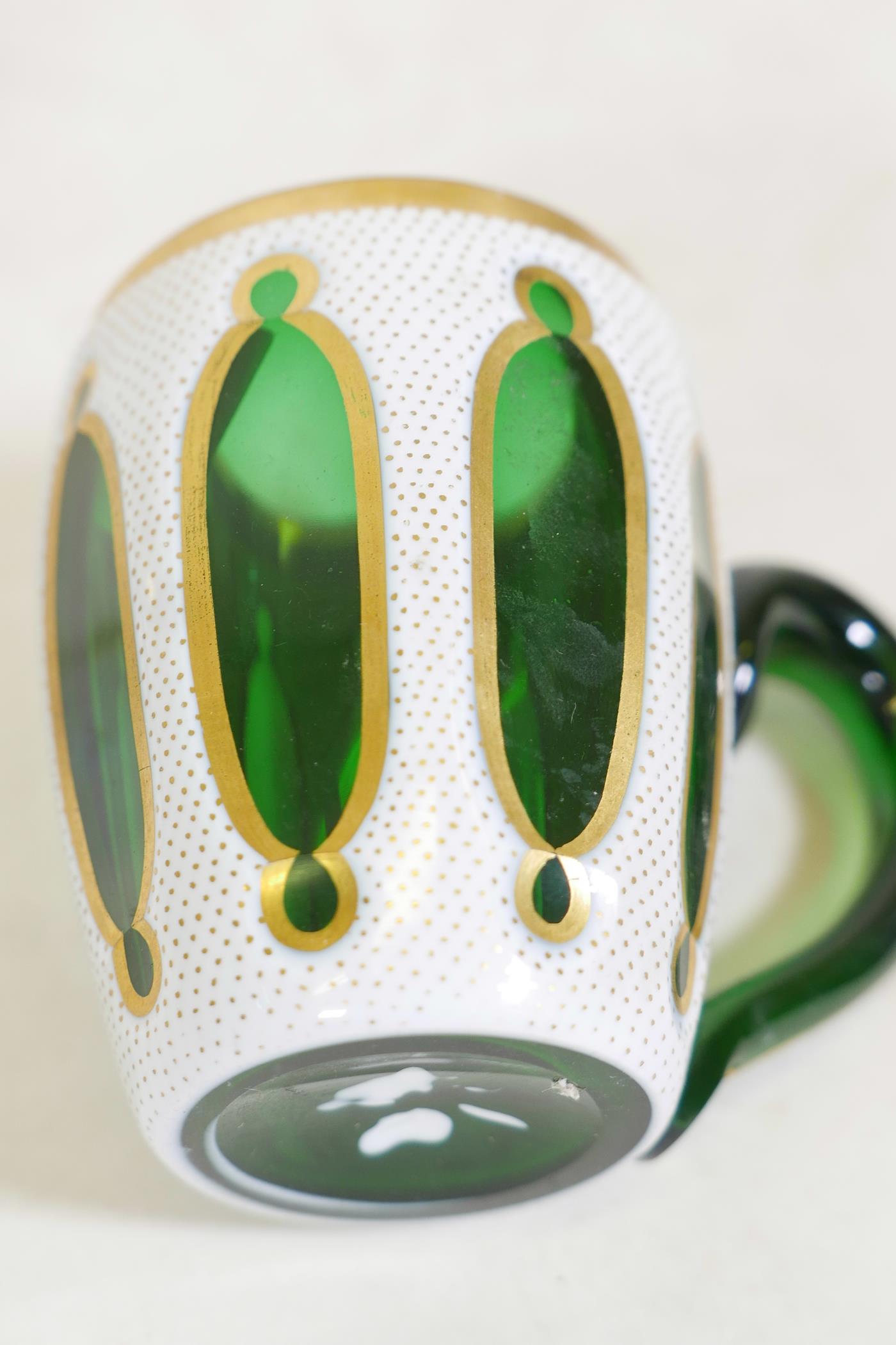 A pair of Bohemian overlaid and gilt glass mugs, 3½" high - Image 3 of 3