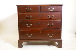 A C18th Georgian mahogany chest of good proportions with crossbanded top, and two over three moulded