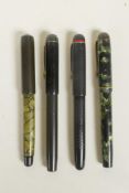A collection of four Esterbrook 'Relief' fountain pens, various models, with 14ct gold nibs, 5" long