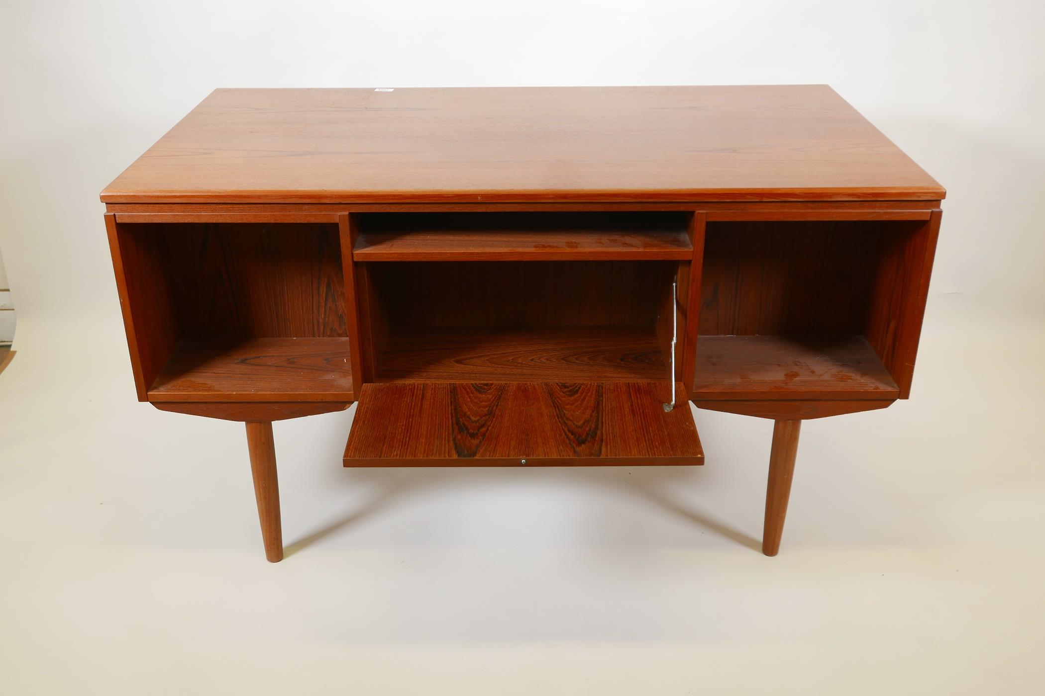 A Danish 1960s teak two sided desk designed by J. Svenstrup for A.P. Møbler, with six drawers to one - Image 4 of 4