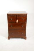A mahogany three drawer chest with brushing slide on bracket feet, 34" high, 24" wide, 27" deep