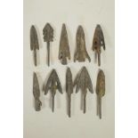 A collection of ten archaic bronze arrowheads, 3½" longest