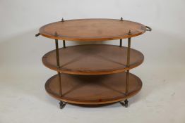 A satinwood three tier etagere, with rosewood banded and ebony strung tops, and brass handles,