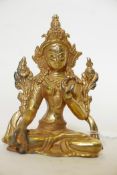 A solid cast gilt bronze figure of Buddha, 4½" high