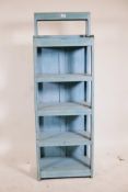 An Indian painted hardwood six tier open shelf with stepped top, 19" x 12" x 55"