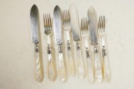 A set of four American 'Gorham Silver and Silver Plate' fish knives and forks, with mother of
