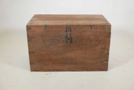 An Indian teak blanket box, with brass mounts, the interior fitted with a candle box, 30" x 18" x