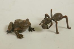 A Japanese Jizai style bronze incense stick holder in the form of an ant, and another of a frog,