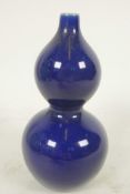 A small Chinese blue glazed porcelain double gourd vase with seal mark to base, 4½" high