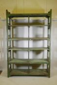 An Indian hardwood open shelf/rack with distressed paintwork, 60" x 18" x 95"