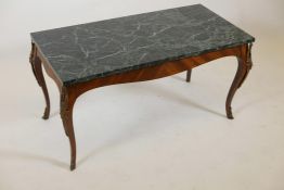 A mahogany coffee table with an adapted vert de mer style top and gilt metal mounts, 35" x 17",