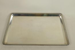 A hallmarked silver tray from the Goldsmiths and Silversmiths Company, London, 11" x 8", 576g