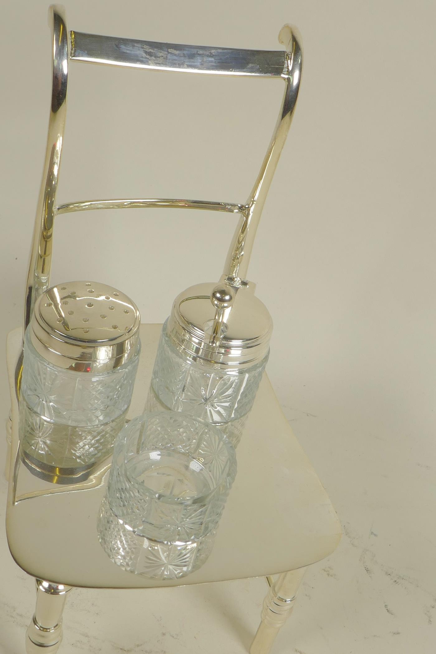 A silver plated cruet, the stand in the form of a bar back chair, 8" high - Image 2 of 3