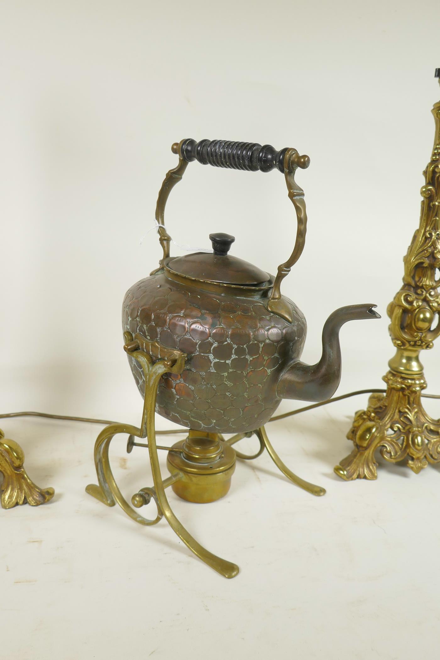 A pair of bronzed metal lamps on triform bases with gadrooned and swag moulded decoration, - Image 3 of 4