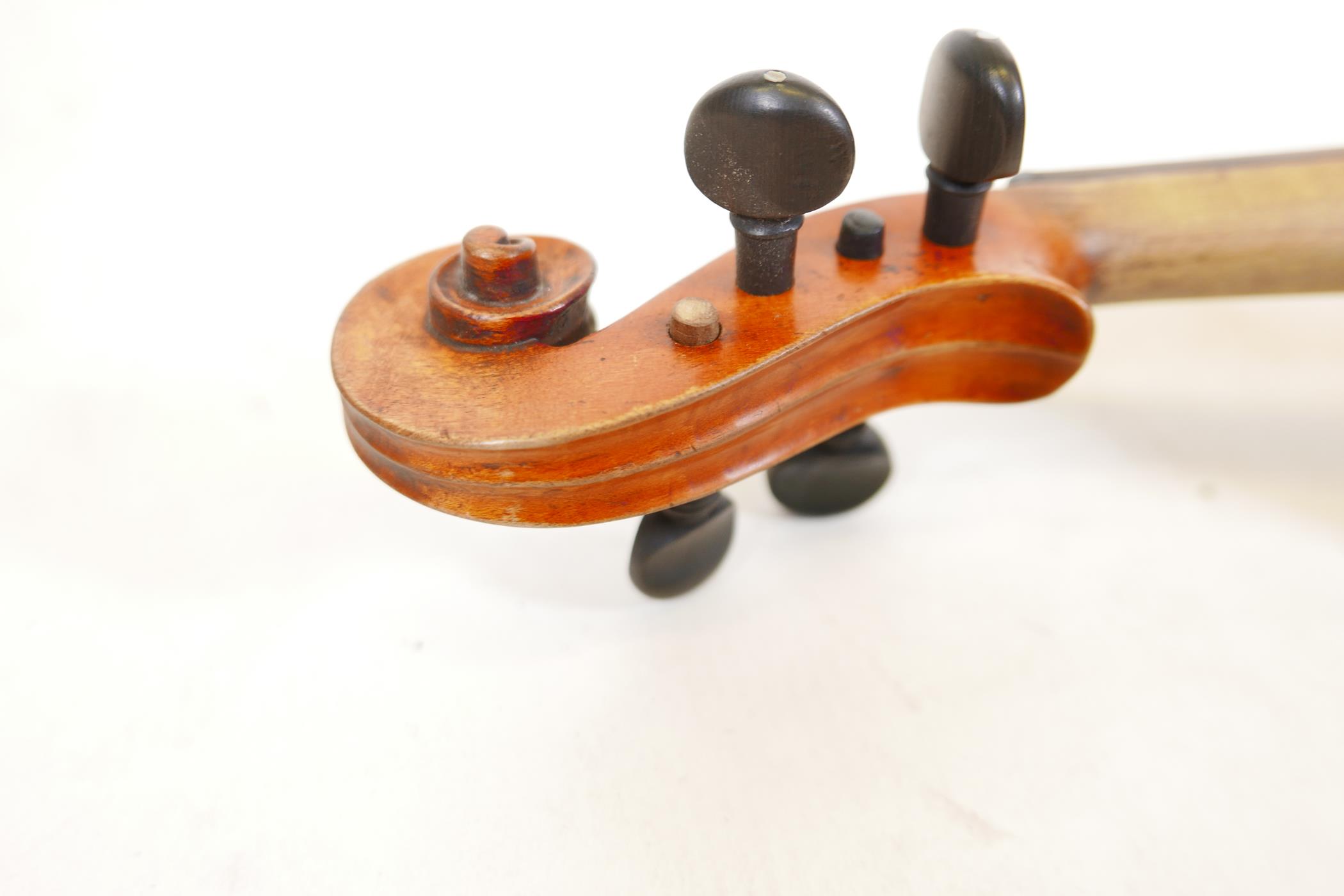 A late C19th/early C20th violin in ebonised wood case, no label, one piece back, split to front, and - Image 6 of 9