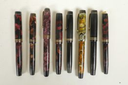 A collection of eight Parker 'Duofold' fountain pens, US and Canadian made, some with 14ct gold