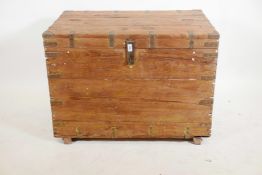 An Indian teak chest with brass mounts and hinged fold over top, 36" x 24" x 26"