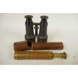 A pair of vintage binoculars, 6" long, and a vintage brass telescope in leather case