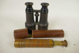 A pair of vintage binoculars, 6" long, and a vintage brass telescope in leather case