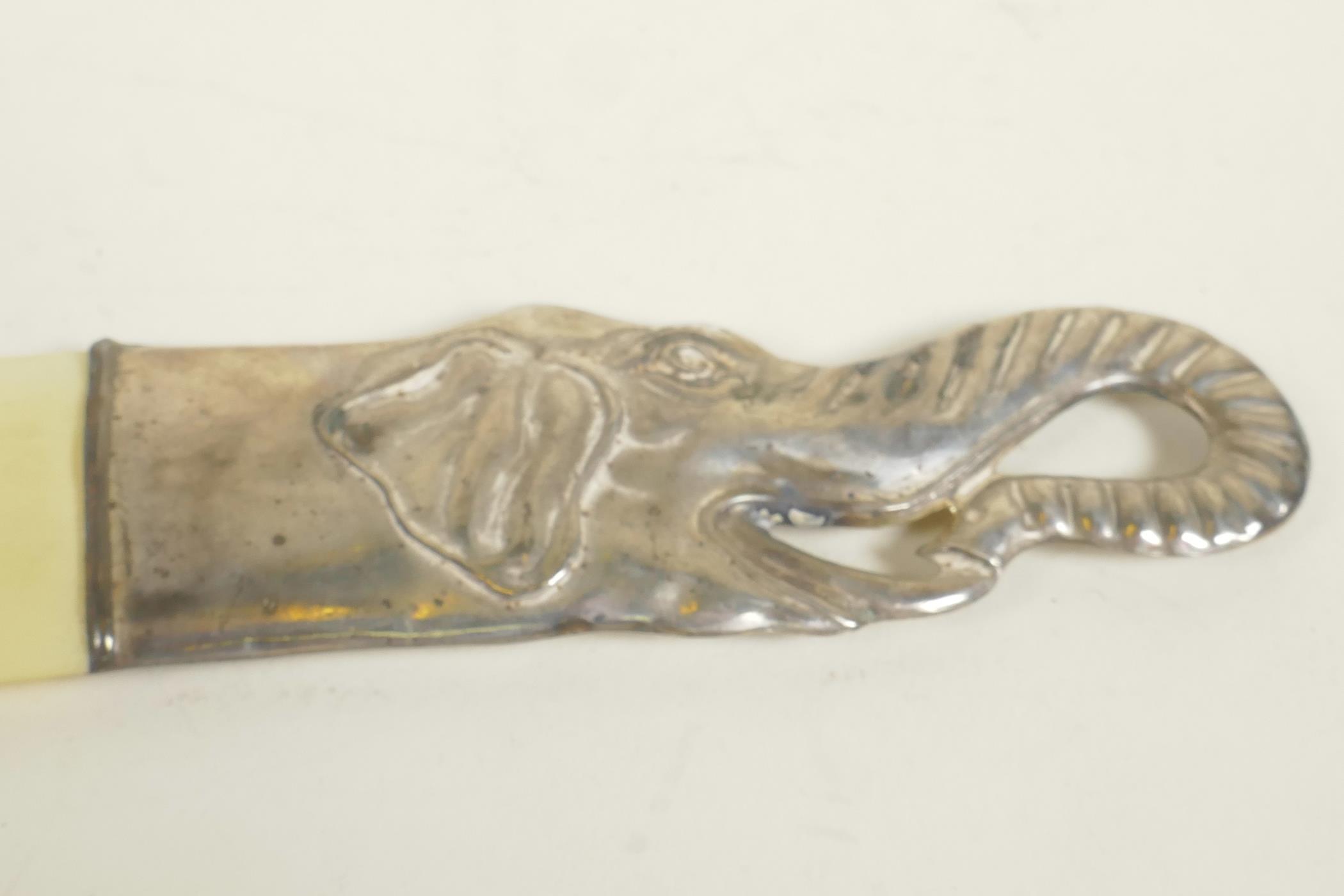 A bone letter opener with silver plated elephant's head handle, 10½" long - Image 2 of 3