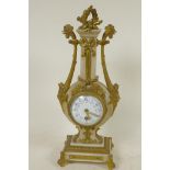 A C19th French ormolu and alabaster boudoir clock, the swept side columns with cockerel head