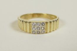 A ribbed yellow gold and diamond set ring, approximate size 'L'