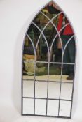 A Gothic style wall mirror with galvanised frame and lattice decoration, 45½" x 20½"