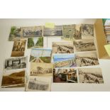 A box of vintage postcards including India, Tripoli, USA, Europe and UK, approximately 600