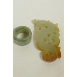 A Chinese green jade archer's ring and a carved jade dragon pendant, largest 3"