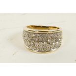A 9ct gold dress ring set with multiple small diamonds (1ct total), size 'N'