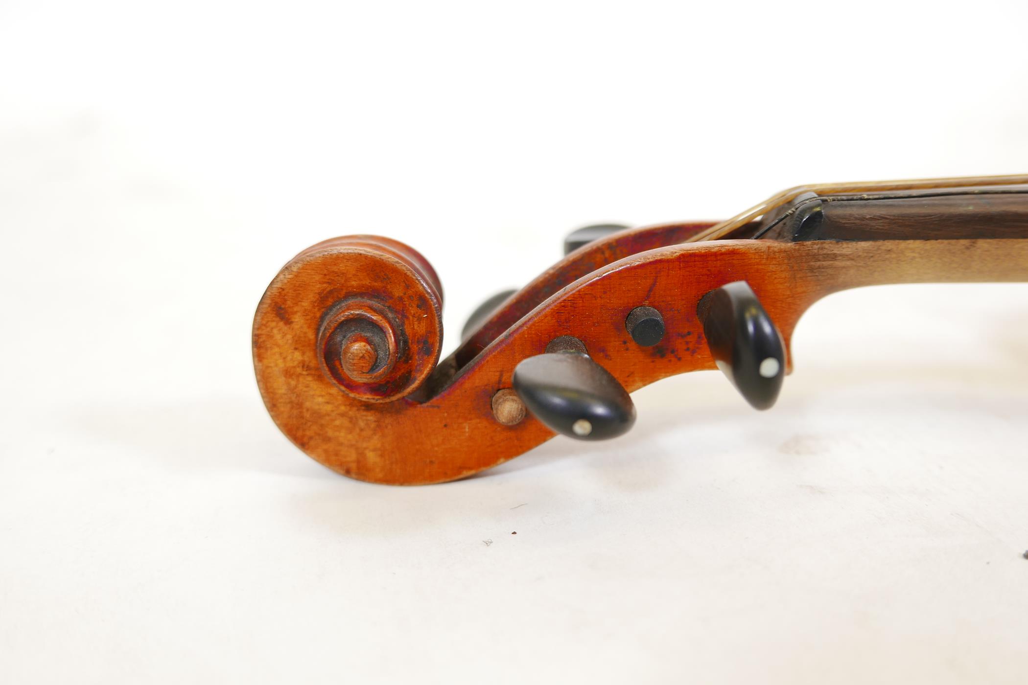 A late C19th/early C20th violin in ebonised wood case, no label, one piece back, split to front, and - Image 5 of 9