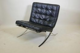 A chrome and black leather 'Barcelona' chair after Mies van der Rohe, lacks strapping, 29" wide, 29"