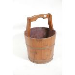 A traditional brass bound pine bucket, 22" high