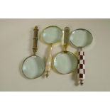 Four desk top magnifying glasses with glass, brass and shell handles, 10" diameter