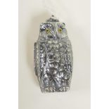 A silver plated sovereign case in the form of an owl, 2½" high